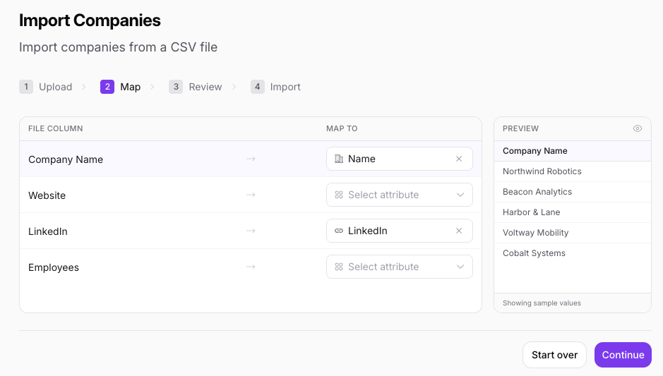 The Relaticle import wizard's column-mapping step with live sample values